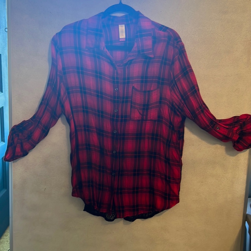 Red/Black shirt w/ black lace in the back.